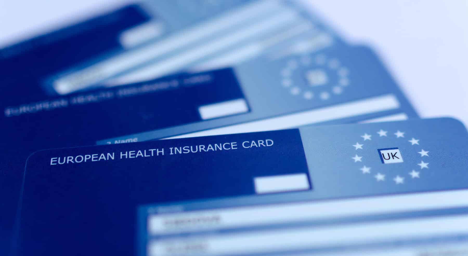 Three blue European Health Insurance Card